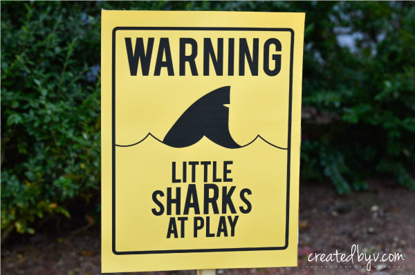 Warn {and welcome} your guests to the party with these fun shark sighting signs!