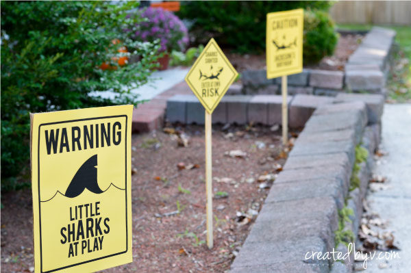 Warn {and welcome} your guests to the party with these fun shark sighting signs!