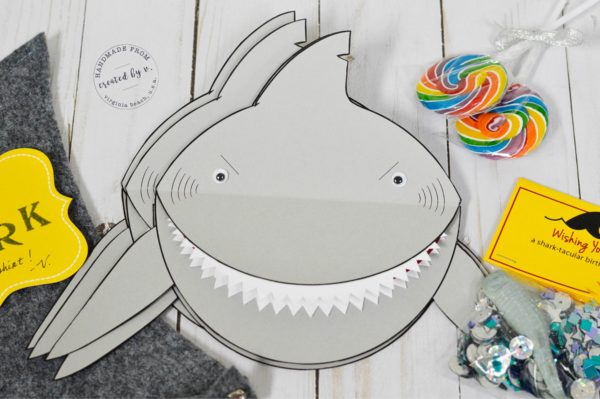 Perfect for shark lovers and under the sea parties alike. Start your celebration with these adorable {+menacing} shark invitations. Watch out, they bite!